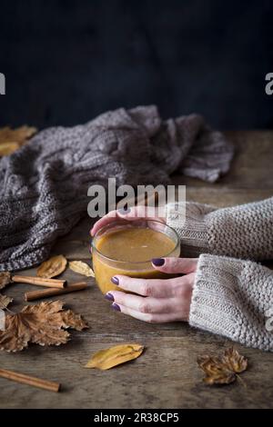 Cup of a warm pumpkin spice latte Stock Photo