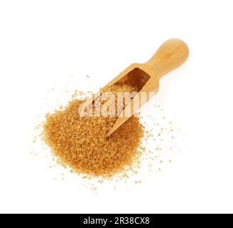 Wooden scoop spoon full of brown cane sugar Stock Photo