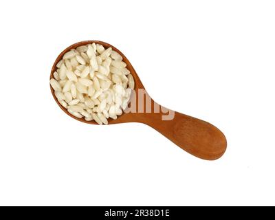 White Arborio rice in wooden scoop on white Stock Photo