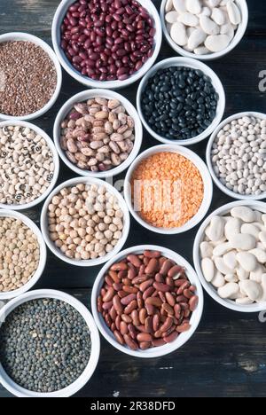 Various beans in bowls Stock Photo