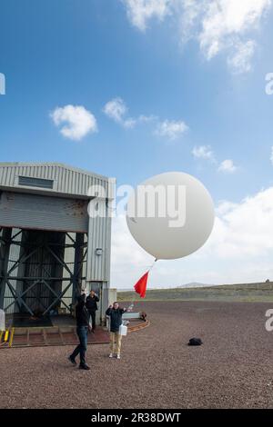 Weather balloon being released from Lerwick Met Station on the Shetland Isles off Scotland. Stock Photo