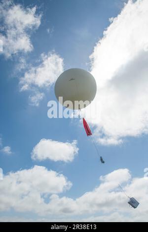 Weather balloon being released from Lerwick Met Station on the Shetland Isles off Scotland. Stock Photo