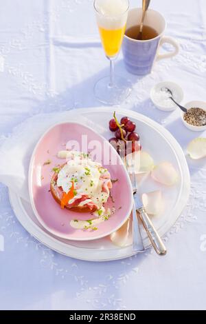 Eggs Benedict with parsley Stock Photo