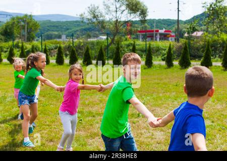 School children having a good time playing-around Stock Photo