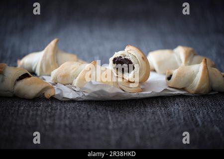 Vegan puff pastries filled with a sugar-free chocolate spread Stock Photo