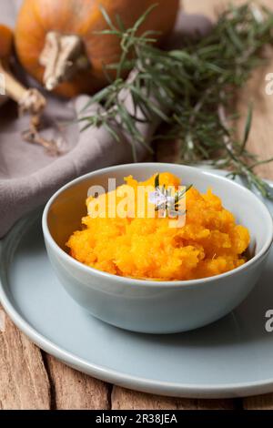 Mashed butternut squash with rosemary Stock Photo