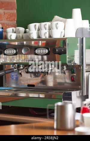 Espresso machine, hot water dispenser and coffee grinder in a bar Stock  Photo - Alamy