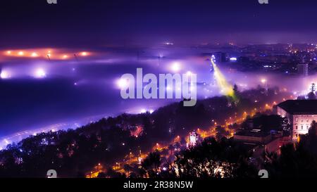 Fog over night city Stock Photo