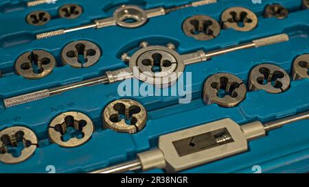 Screw tap and screw threading die set Stock Photo