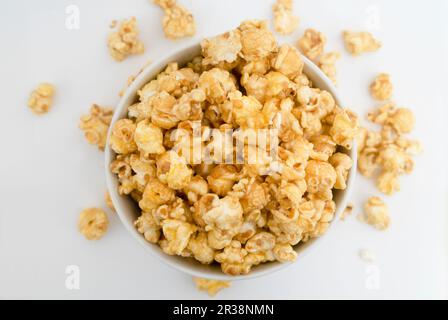 Popcorn in a white bowl Stock Photo