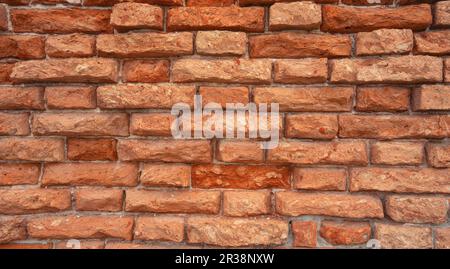 Brick wall of red color, wide panorama of masonry Stock Photo