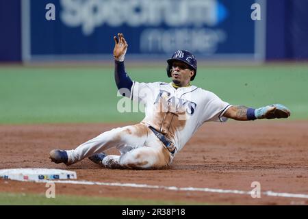 St. Petersburg, FL. USA; Tampa Bay Rays shortstop Wander Franco (5) slides  awkwardly into home plate and injures his forehead during a major league b  Stock Photo - Alamy