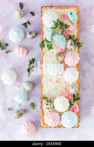 Traditional Polish Easter cake (mazurek) decorated with colorful meringues Stock Photo