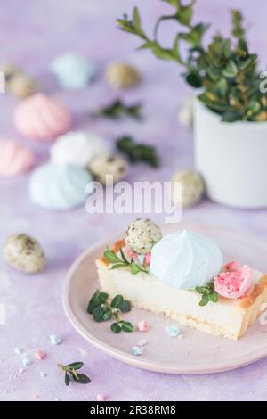 Slice of a Polish Easter cake (mazurek) decorated with colorful meringues Stock Photo