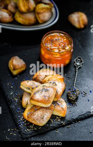 Curd cookies and apricot jam with lavender Stock Photo