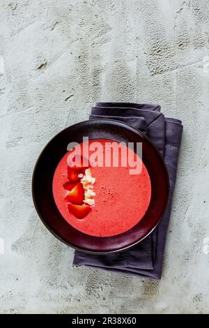A strawberry smoothie in a bowl for breakfast (seen from above) Stock Photo