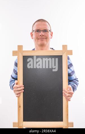 Man with black chalkboard Stock Photo
