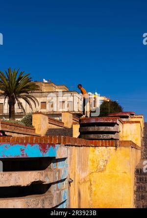 Eritrean children playing in Mai Jah Jah Fountain, Central Region, Asmara, Eritrea Stock Photo