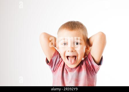 Young messy boy with chocolate on his face Stock Photo