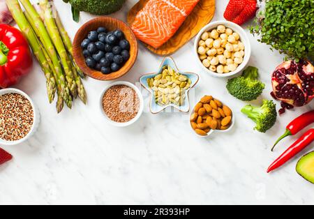 Superfoods on white background. Healthy nutrition top view Stock Photo