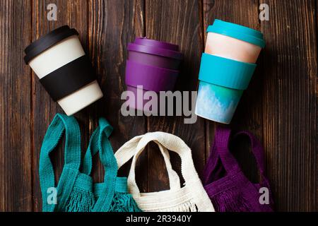 Cotton mesh bags and bamboo coffee mugs Stock Photo