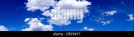 Blue sky background with white clouds. Cumulus white clouds. Panoramic image Stock Photo