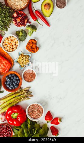 Superfoods on white background. Healthy nutrition top view Stock Photo