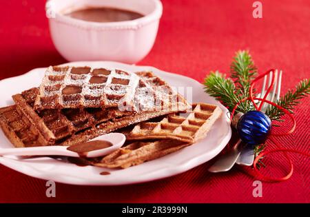 Chocolate waffles with chocolate sauce for Christmas Stock Photo