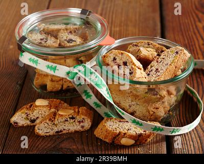 Cantuccini with cranberries and gingerbread spice in mason jars Stock Photo