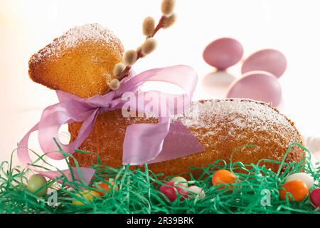 Baked Easter lamb cake in a nest Stock Photo