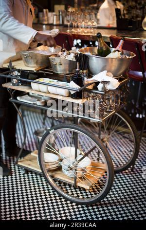 A serving trolley with ingredients for cocktails and drinks Stock Photo