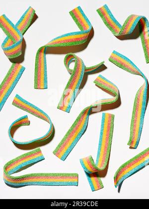 Four-colored fruit gum strips on a white background Stock Photo