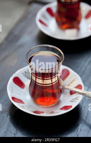 Turkish tea in traditional tulip shaped glasses Stock Photo