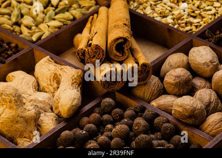 Different spices and herbs in a box Stock Photo