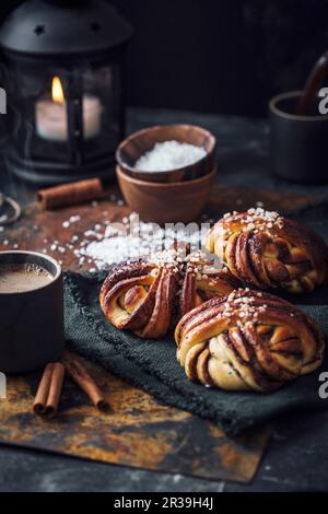 Swedish cinnamon buns with coffee Stock Photo