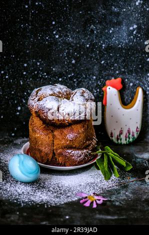 Easter cake, blue egg and gingerbread chicken Stock Photo