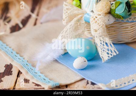 Macro ceramic Easter egg on blue napkin Stock Photo