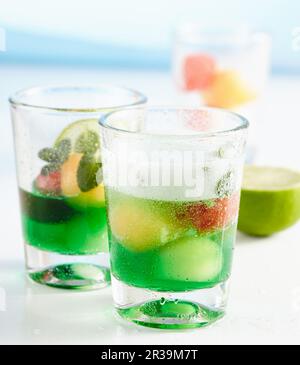 Non-alcoholic melon and mint punch served in glasses with melon balls Stock Photo
