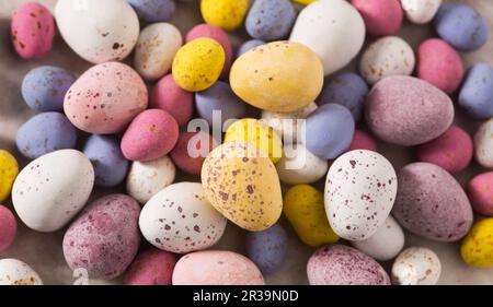 Full frame overhead shot of chocolate Easter mini and micro eggs Stock Photo