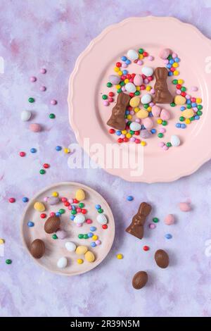 Easter candies on a pink plates Stock Photo