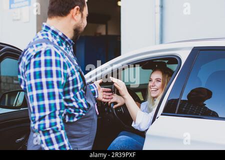 Regular customer arrived at a vehicle inspection Stock Photo