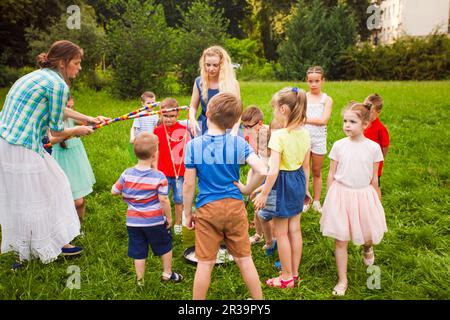 Best entertainment with bubbles show for kid's birthday party Stock Photo