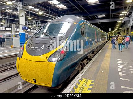 Avanti West Coast Glasgow bound Pendolino 390152, electric, engine, train, at, Euston platform 1, London, England, UK, NW1 2RT Stock Photo