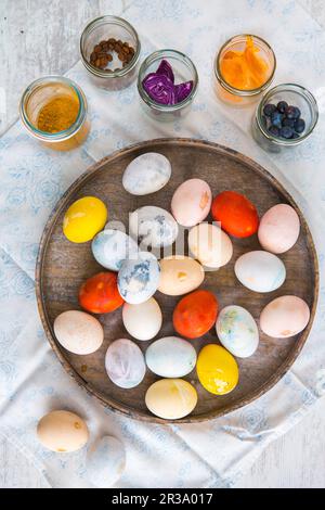 Colourful Easter eggs on a plate Stock Photo