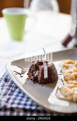 Chocolate cake with stewed rhubarb Stock Photo