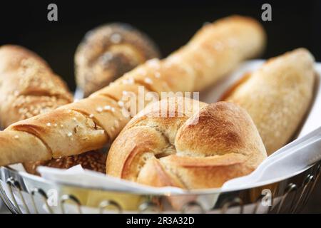 Assorted bread rolls in a bread basket Stock Photo