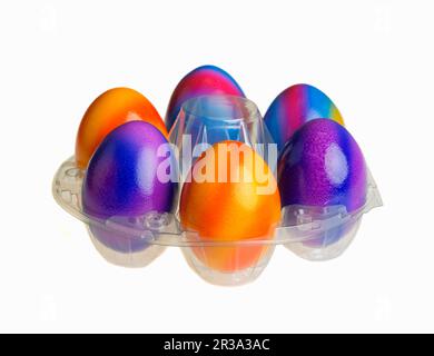 Colourful Easter eggs in a plastic holder Stock Photo