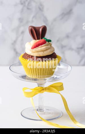 Carrot cupcake on a cake stand Stock Photo