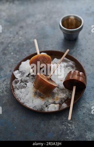 Ice lollies on crushed ice Stock Photo