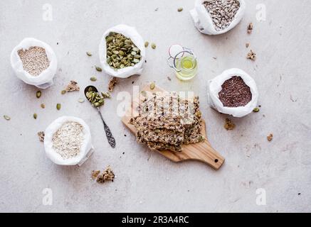 Crispy seed cracker made from oats and different seeds Stock Photo